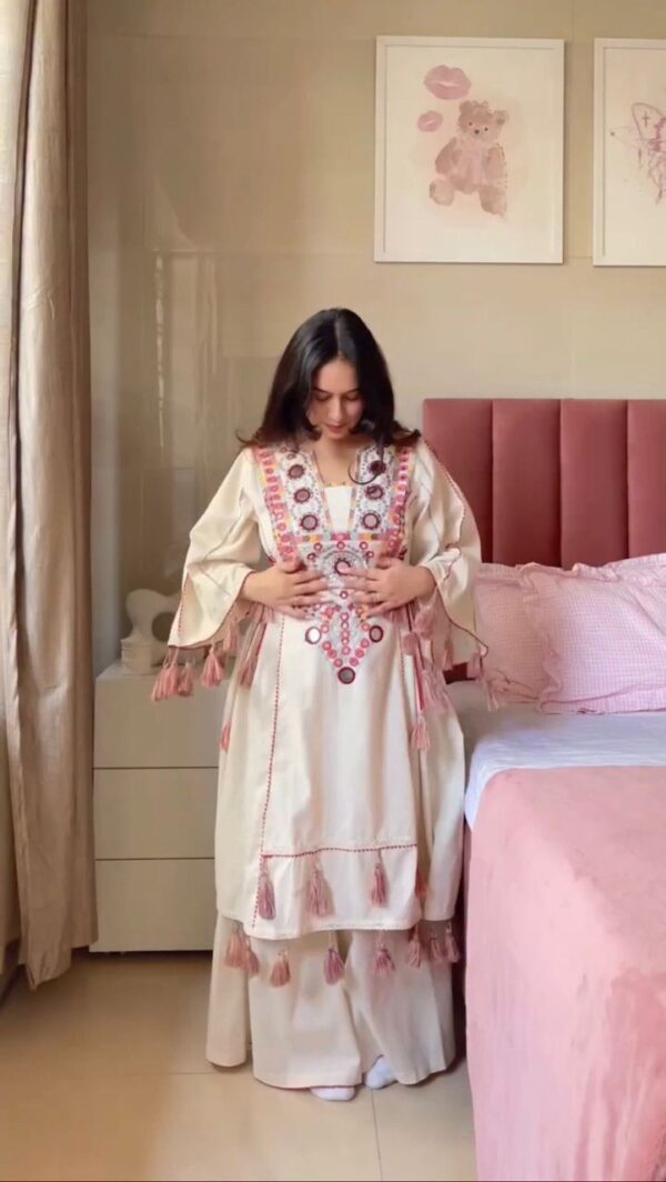 Buy Rayon Peplum and Bell Bottom Set with Real Mirror and Tassel Work